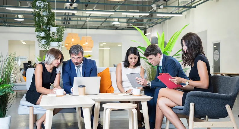 Business professionals collaborating in a meeting